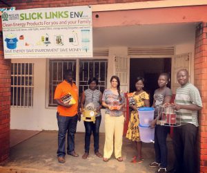 enventure-team-visiting-rice-team-at-their-internet-cafe-and-clean-energy-business-liberia-and-esther-are-second-and-third-from-the-right